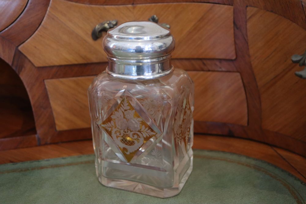 A George V silver lidded amber flash cut glass scent jar, makers mark rubbed, London, 1931, 16.5cm.